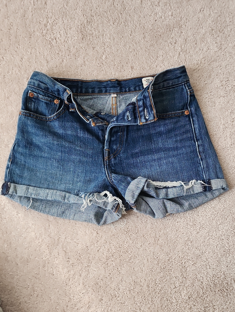 Levi's Distressed Dark Blue Rolled Hem Denim Shorts